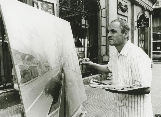 El pintor español Antonio López, pintando en la Gran Vía.